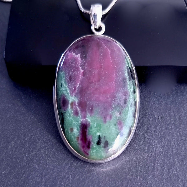 Ruby Zoisite jewellery set in 925 sterling silver featuring vibrant red Ruby crystals within rich green Zoisite, creating unique natural patterns