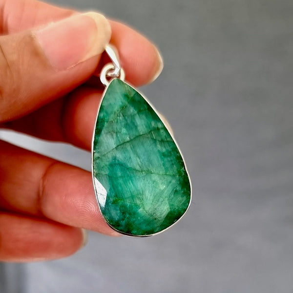 Sterling silver Emerald jewellery featuring vibrant green simulated emerald gemstones.