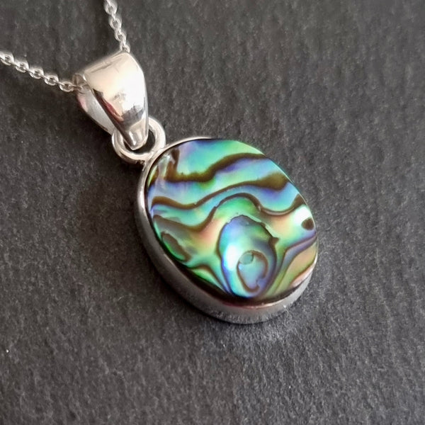 Sterling silver Abalone pendant featuring vibrant natural iridescent blue, green and purple shell with a polished finish.