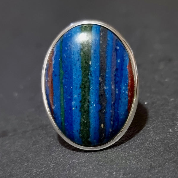 Rainbow Calsilica jewellery set in 925 sterling silver featuring vibrant bands of blue, green, pink and earthy colours with striking natural patterns