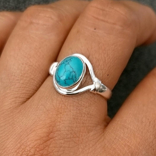 Sterling silver turquoise jewellery featuring blue, green and purple reconstituted copper turquoise gemstones.