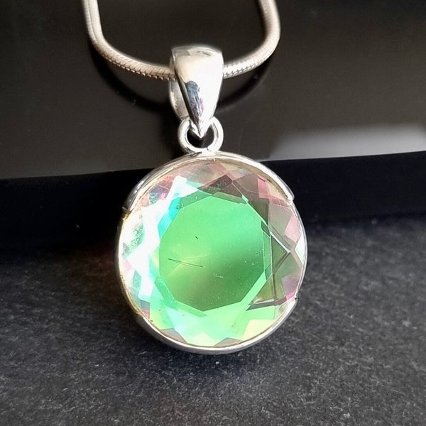Mercury Mist Topaz sterling silver jewellery featuring a metallic iridescent gemstone with silver, blue and violet tones.