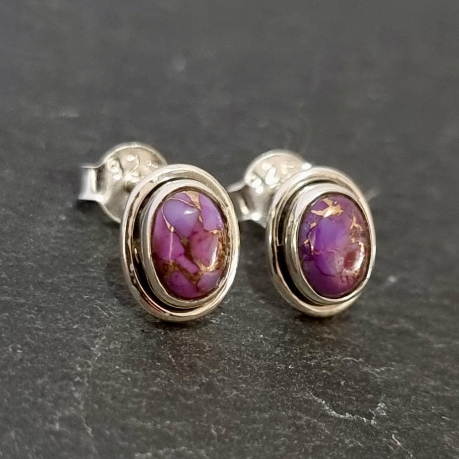 Elegant Oval Purple Copper Turquoise Stud Earrings in 925 Sterling Silver, featuring a sleek plain silver rim around the light pinky purple gemstone which has mottled copper markings on.  Stud size is Height 1.0cm x Width 0.8cm
