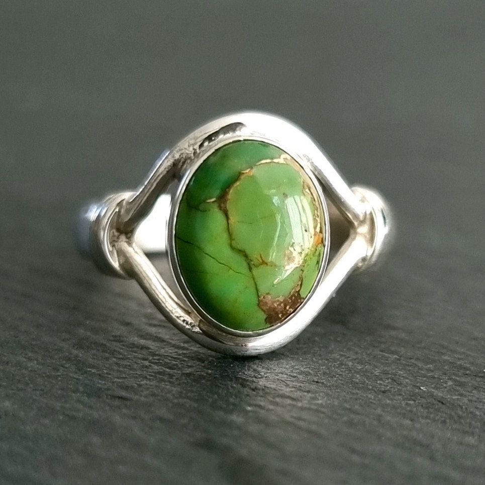 Silver rings with outlet green stones